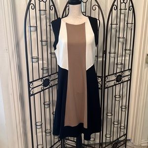 Black, tan, and cream dress.